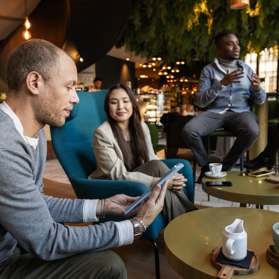 people talking in a cafe